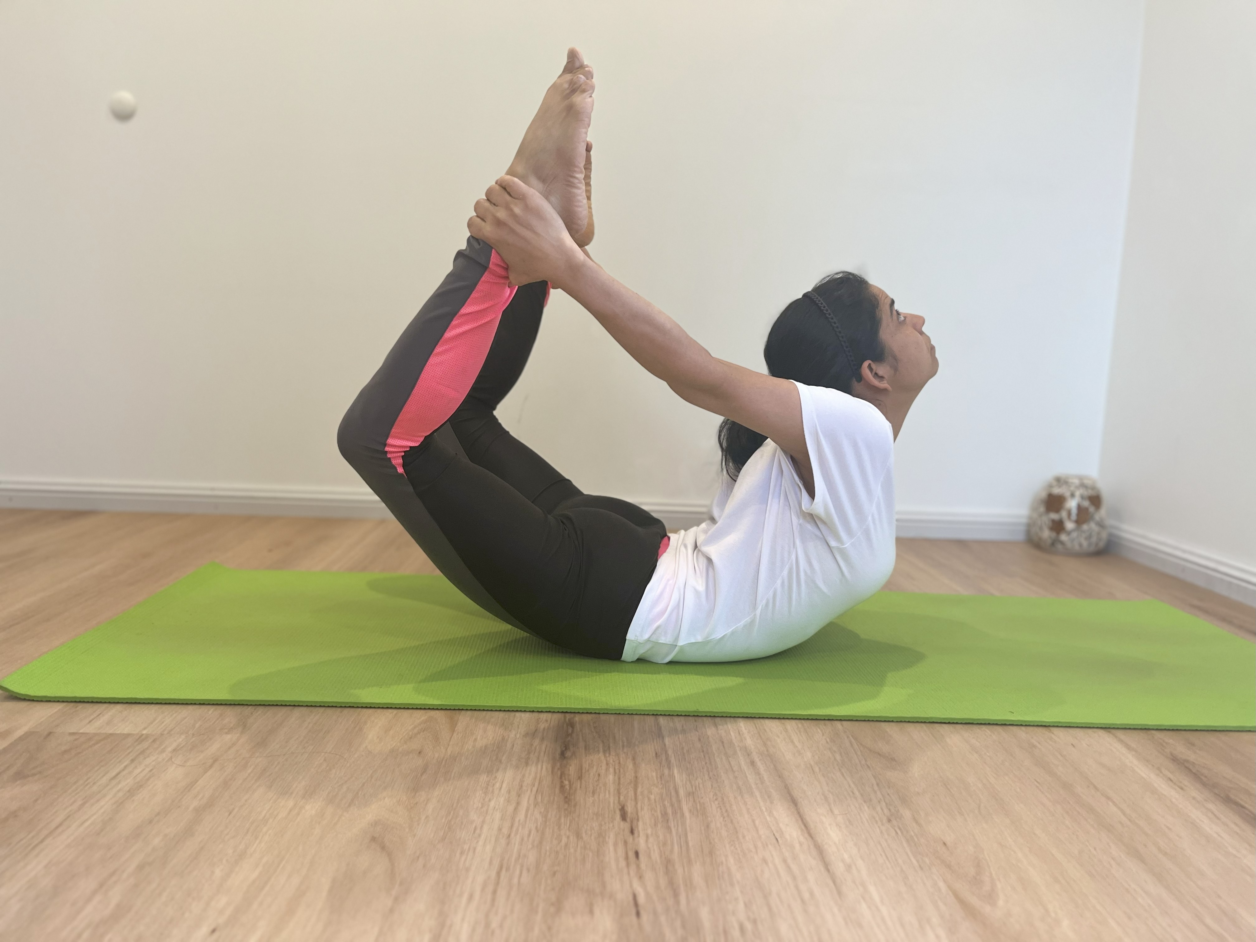 Gentle bedtime yoga poses for better sleep quality taught by certified instructor Deepti